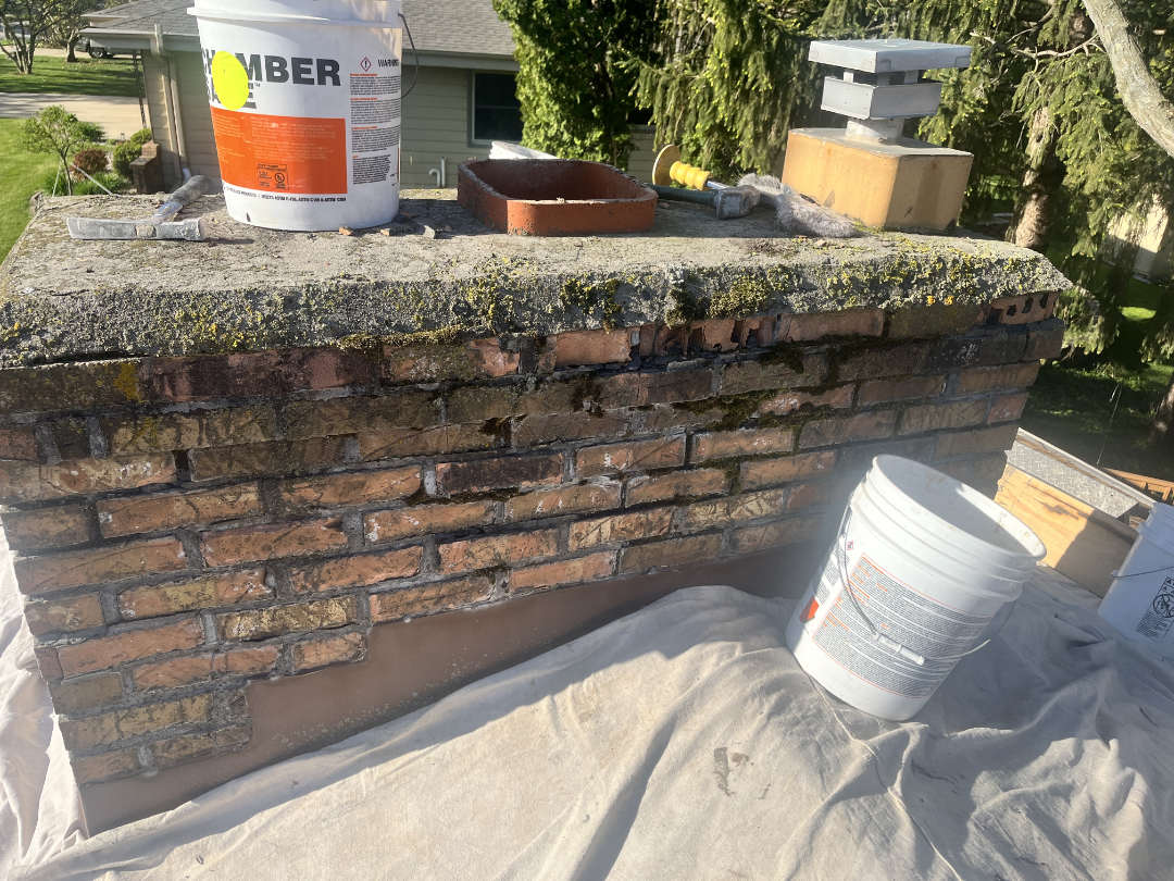 Chimney before rebuilding Deteriorated Chimney